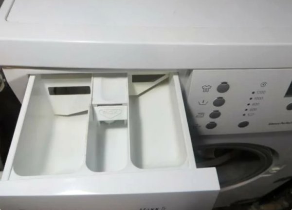 Как легко отмыть лоток стиральной машины